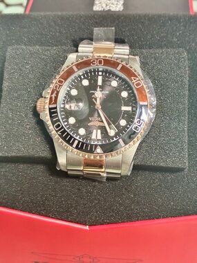 Invicta pro diver model 44717. Root beer is the color along with rose gold and s